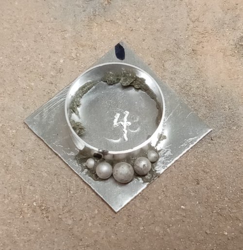 Judy Larson's Split Bead Earrings - Attaching Decorative Balls to the Bezel, Contemporary Wire Jewelry, Filing, Finishing, , sanding, filing, polishing, Place medium paste solder around the inside bottom edge of the bezel.